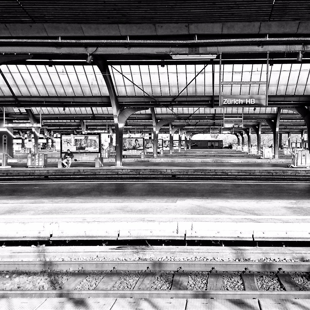 No, I'm not guilty nor complaining about late trains for once, it's that silent moment shortly before noon when no train is in main station.... Tags from Photerloo:
train
building
train station
city
monochrome
black and white
track
urban
railway
steel
architecture
station
metal
structure
rail
transport
transportation system
monochrome photography
train track
street
outdoor
transportation
bench
grinder
iron
photo
dock
metropolitan area
white
rail transport
long
terminal
airport
black
empty
vehicle
platform
park
town
industry
covered
lighting
abandoned