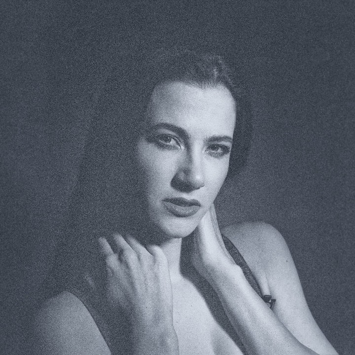 Lauren in the Studio 
Finally I tried my 500 C/M a first time in the studio with a fresnel spot/flash. As the film, an Ektar 800, was 12 years over it's date, I was wondering how the results would look. I did not much like the color thus I did a colored bw version. Scanned with a Nikon Coolscan 9000 you can literally see each corn of grain in the original sized picture. Btw. the strong shadow is on purpose as I try to start a series with a fresnel light and the lighting of the portrait pictures of the 30ies/40ies of the last century... 

http://www.b2s.pm/tmyUis