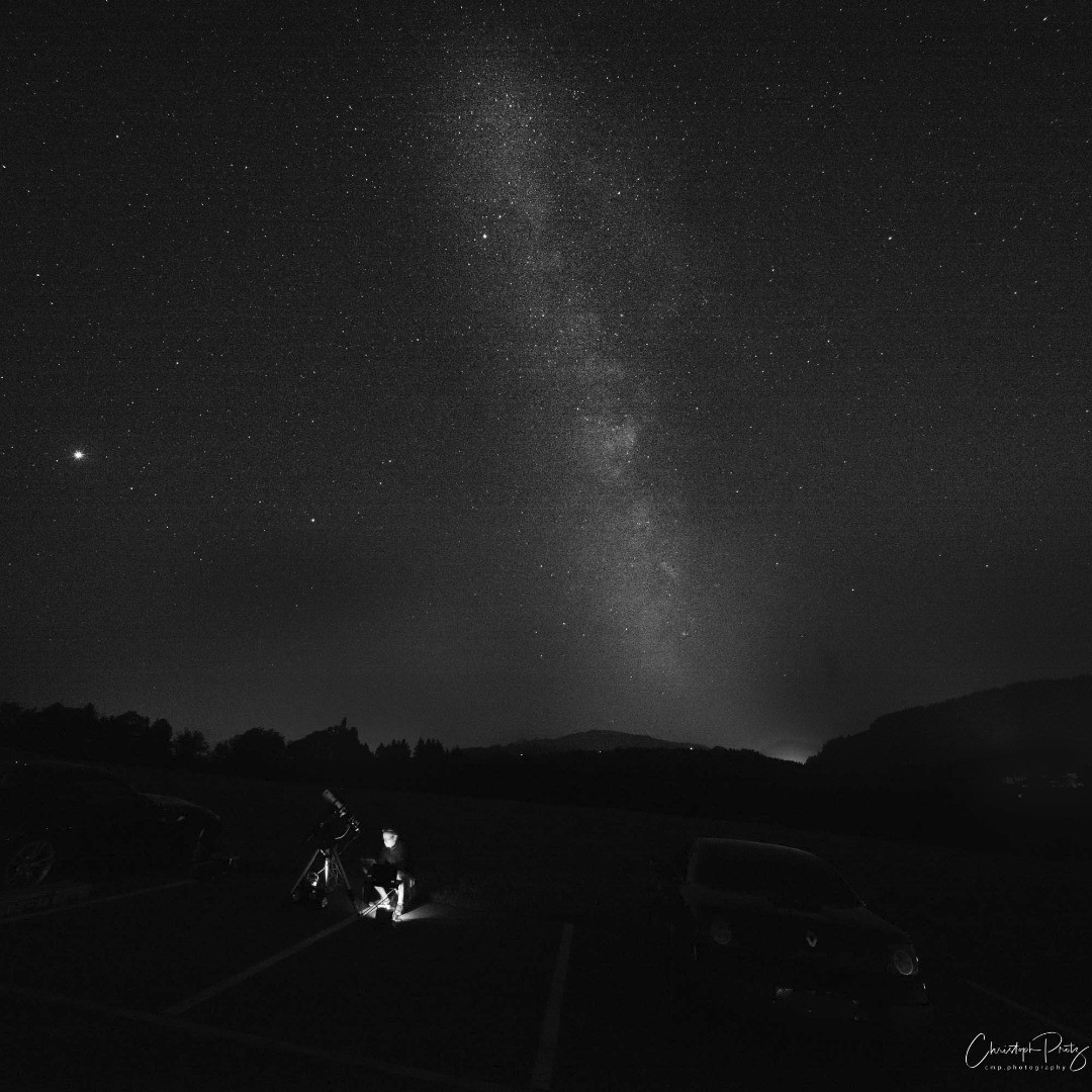 It is Milky Way season over here but the weather did not permit shooting the last weeks in my area. Yesterday finally the sky was not clouded (but there was a lot of humidity in the air as we had the hottest day in Switzerland this summer). My friend and I met on a big public parking as he wanted to try out his telescope equipment on a stable ground. I was playing around with my M10R and M10M, an old 35mm Summilux and the newest Leica 35mm as well as an old 12mm Heliar. I like best this making of shot here with the parking and the telescope and the Milky Way in the background ...
.