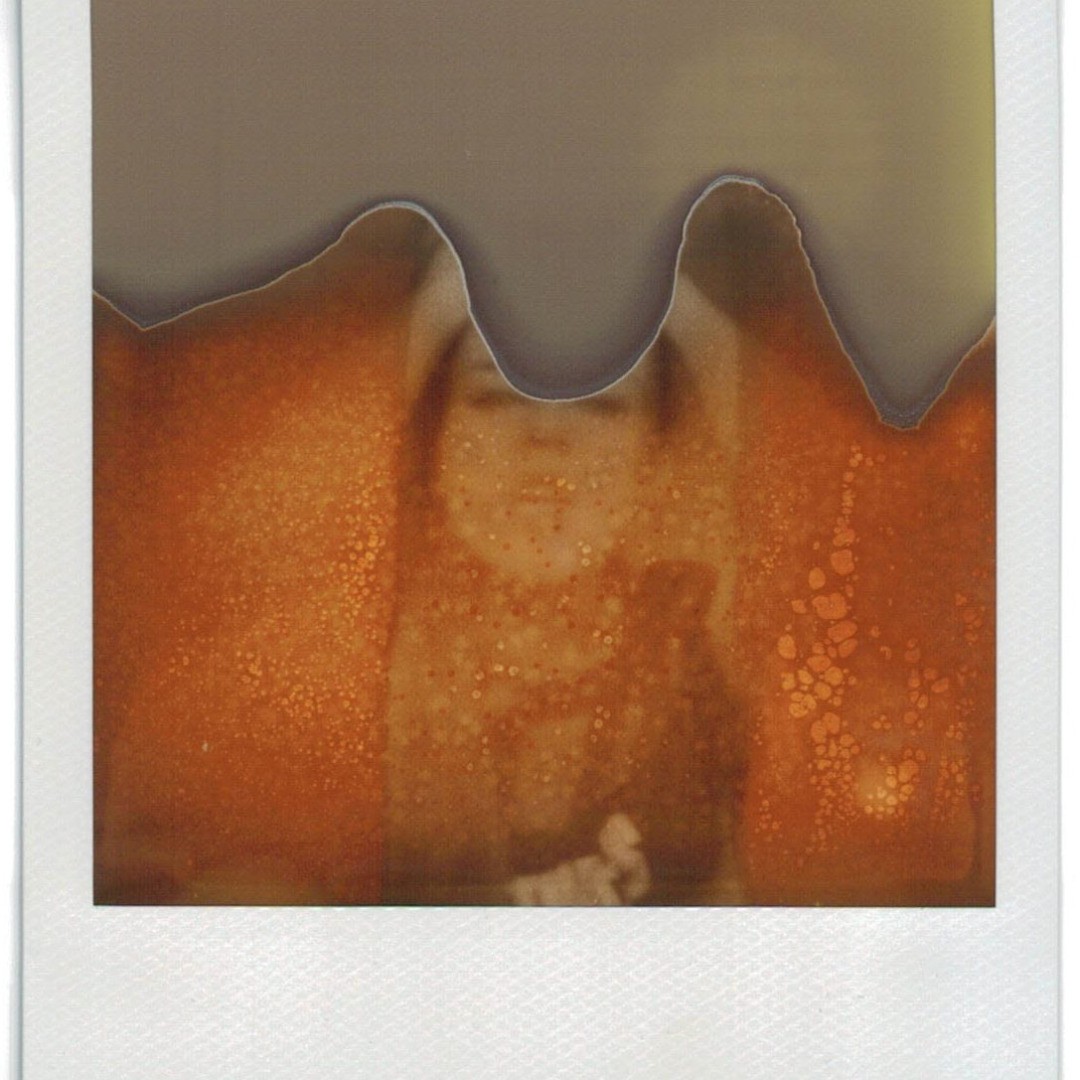 I just found some Polaroid scans from a while ago. I still have an old SX-70 Land camera that belonged to my dad. Used it also in a studio shooting, but had several times just bad luck with the expired films. I'll probably stick to regular analog film again :-) Hey, but it looks like art ;-)